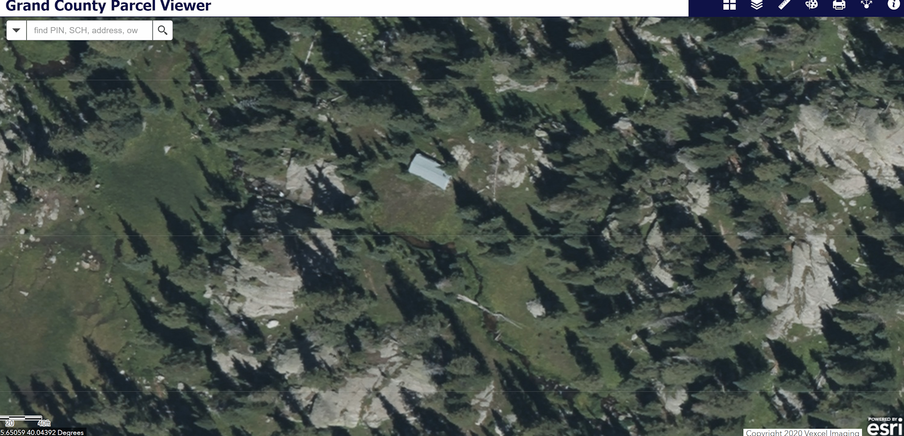 Wheeler Basin cabin aerial view of tin roof